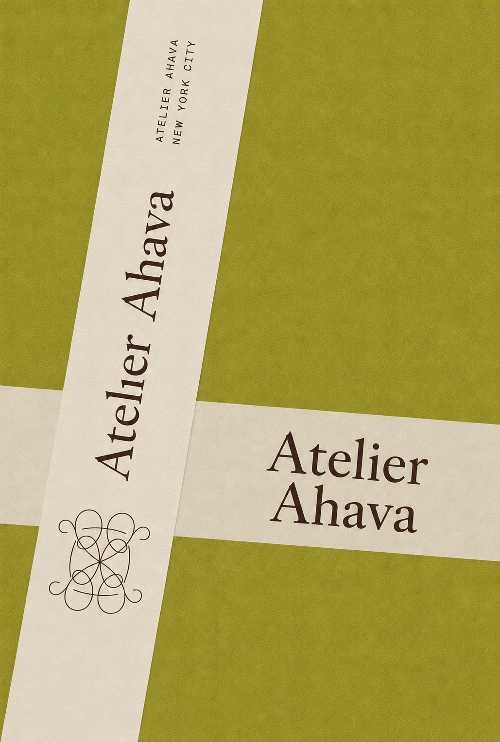 Atelier Ahava branded packing tape on olive kraft