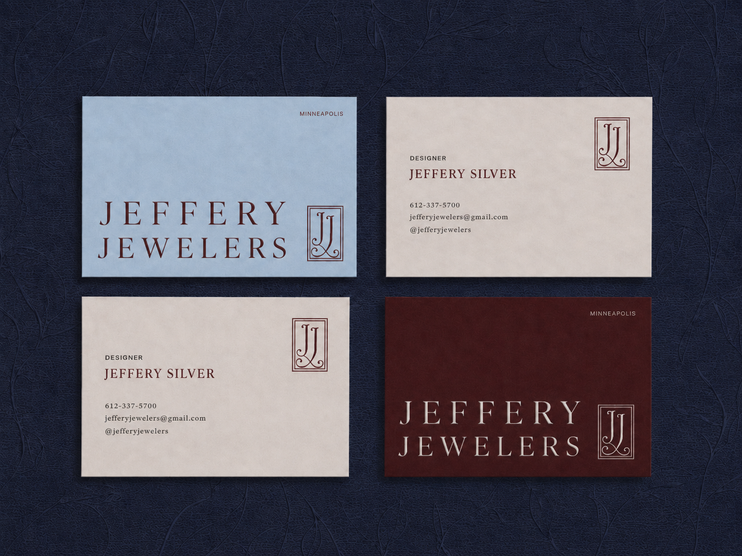 Jeffery Jewelers business cards in powder blue, cream, and burgundy colorways with JJ monogram